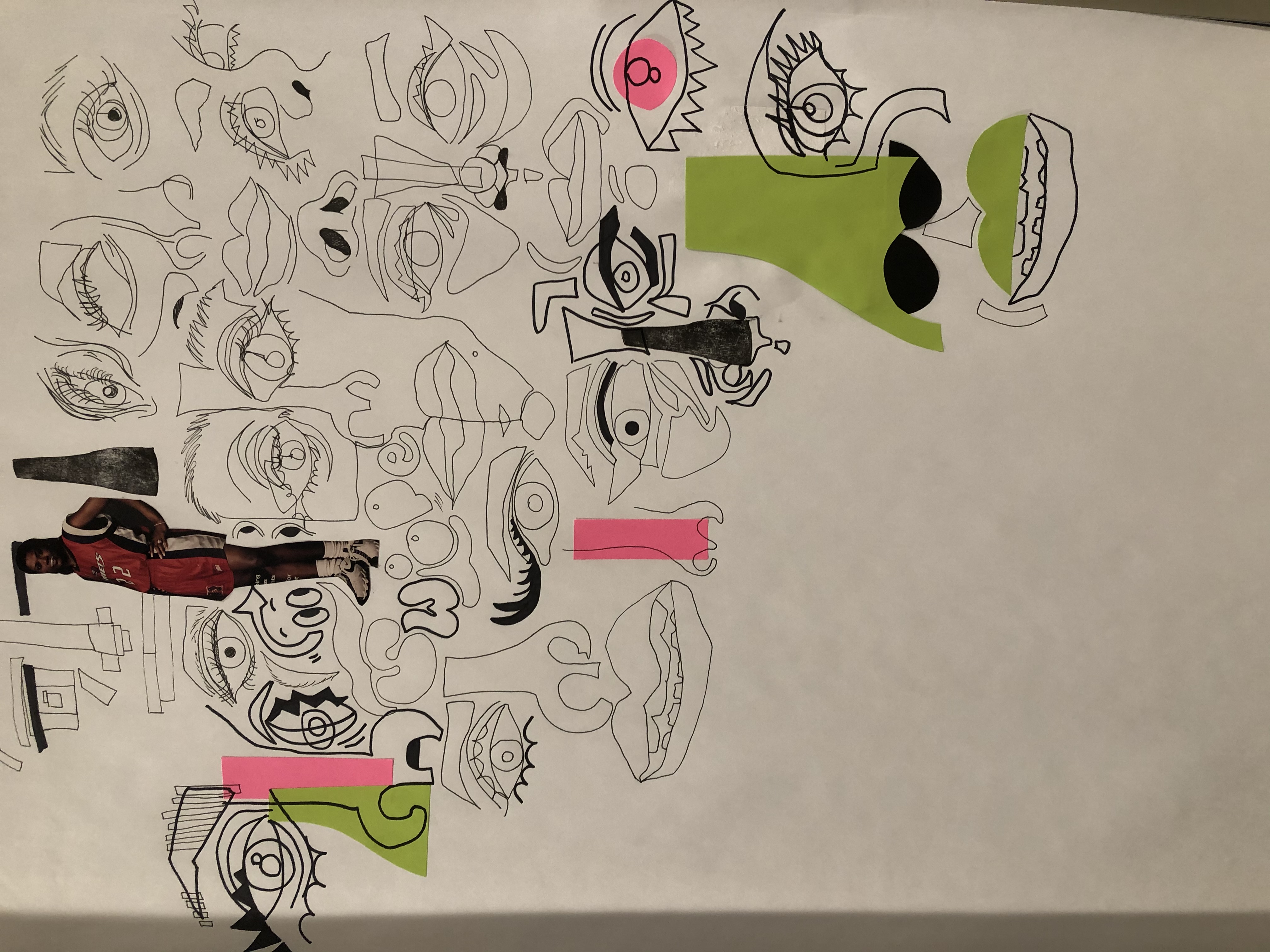 Student collage artwork with mixed media drawings